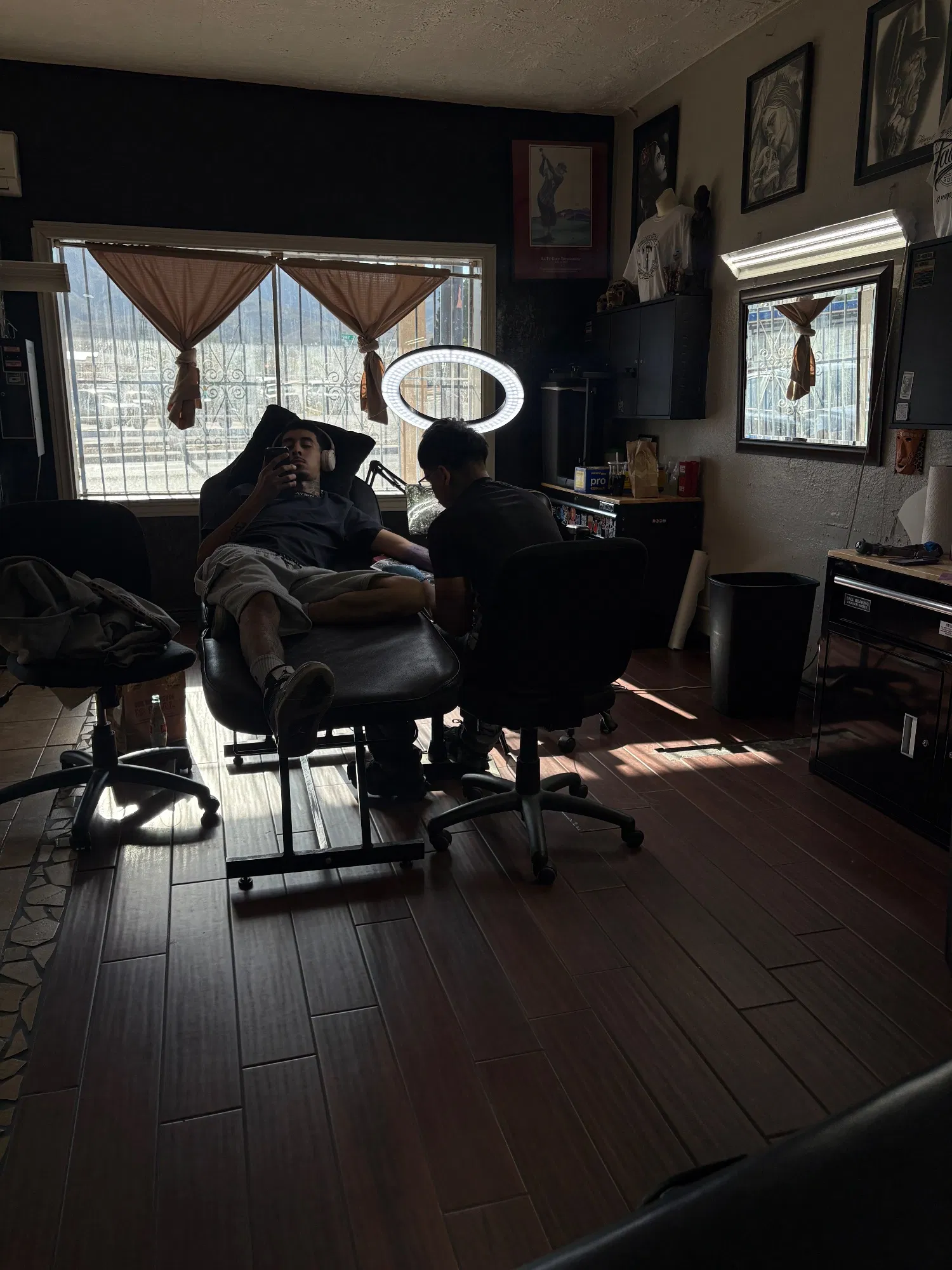 Julian Rangel tattooing in his El Paso studio